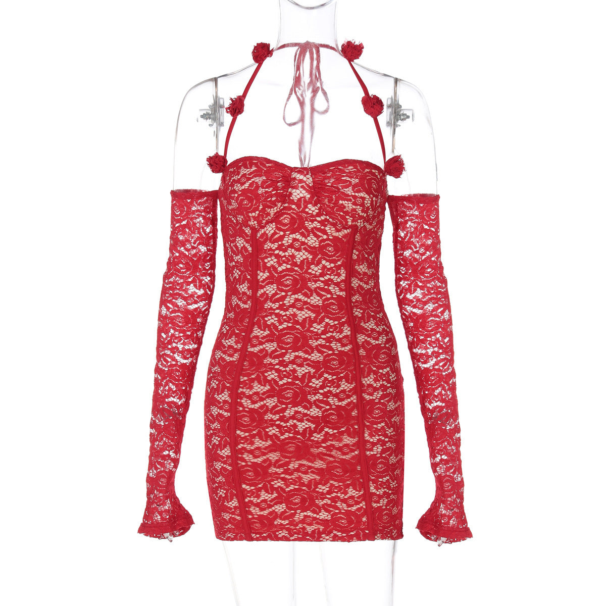 Olkaimeton mekko pitkillä hihoilla, joka korostaa lantiota